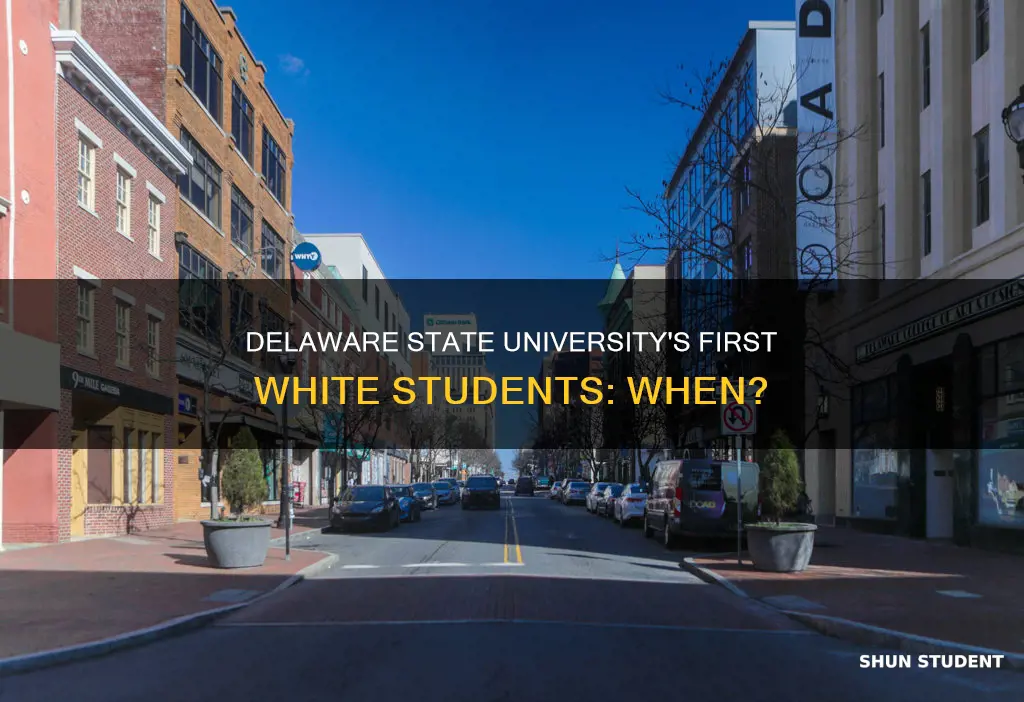 when did delaware state university accept the first white students