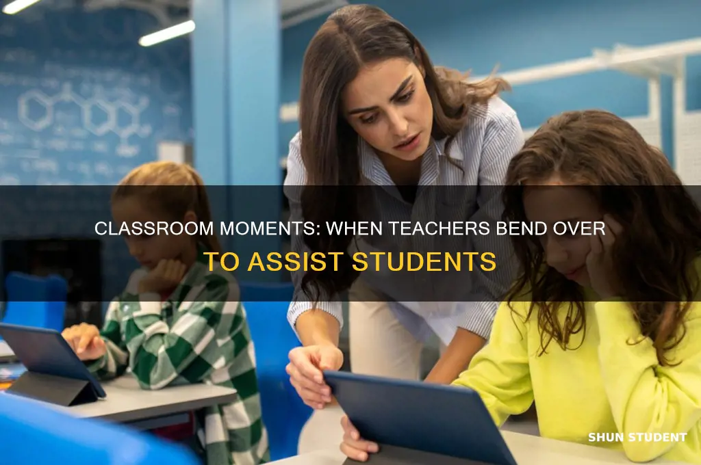 when the teacher bends over to help another student